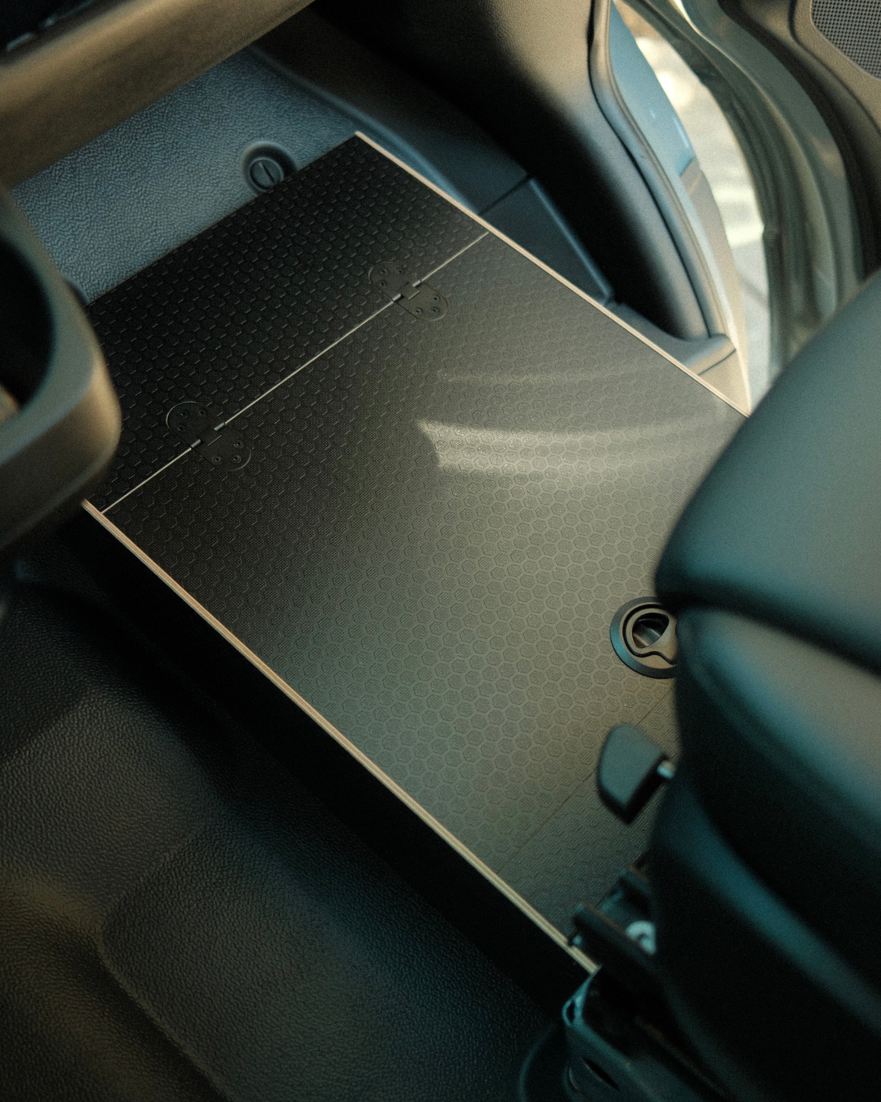 Routed Wild Original Foot Platform passenger footrest installed in a Mercedes-Benz Sprinter van interior.